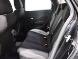 the back seats of a car are black and grey in color
