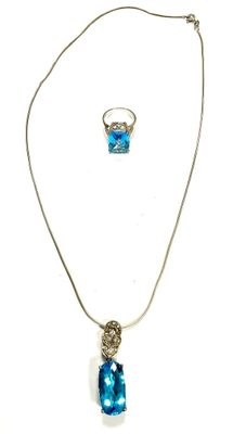 necklace and earring set with blue topaz stone and silver chain