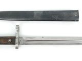 an image of a knife and a knife holder on a white surface