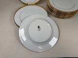 a lot of plates that are sitting on a table