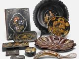 many different types of decorative items displayed on the table