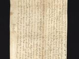 un gros plan d'un morceau de papier sur lequel on a écrit