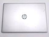 a laptop with a hp logo on the screen