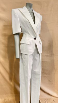 an image of a mannequin dressed in a white suit