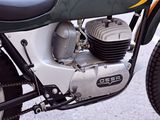 a close up of a motorcycle engine on a street