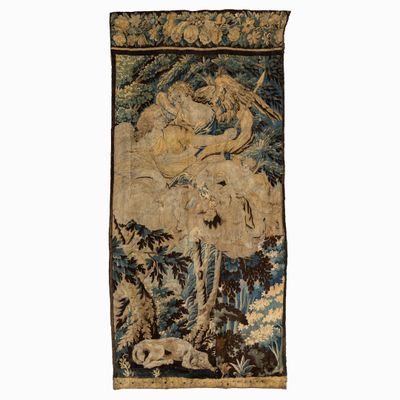 une tapisserie représentant un homme et une femme dans une forêt