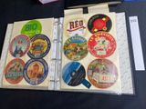 a binder with a lot of stickers on it