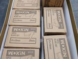 several boxes of wokin are stacked on top of each other in a box