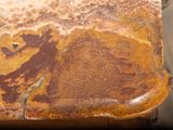 a close up of a table with a marble top on it