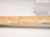 a close up of a baseball bat on a table