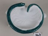 a green and white bowl with a snake inside of it