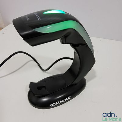 a close up of a computer mouse on a stand