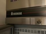 a stainless steel oven with the word innomak written on it