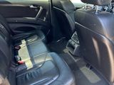the back seats of a car are empty and the passenger seat is empty