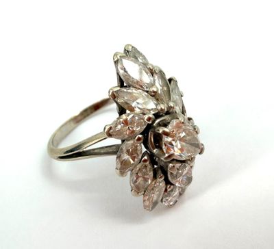 an image of a close up of a ring on a white surface