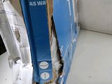 a box of toilet paper sitting on the floor next to a toilet
