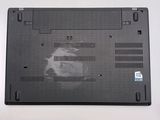 a black laptop with a hole in the bottom of it