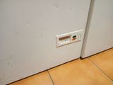 an image of a door with a button on it