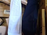 a box full of boxes of clothing and a pair of socks