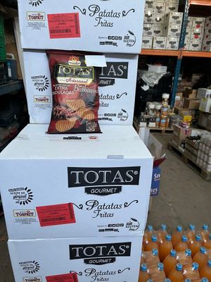 three boxes of total ' s potato chips stacked on top of each other