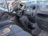 a car that is sitting in a lot with a steering wheel