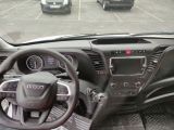 a view of the inside of a vehicle from the driver ' s seat