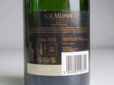 a bottle of wine that is sitting on a table