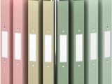 a row of binders with different colors of binders on them