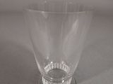 a glass that is sitting on top of a table