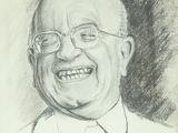 pencil drawing of a smiling man in a suit and tie