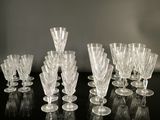 a group of wine glasses sitting on a table