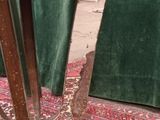 a small table with a glass top on a rug