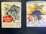 posters on the door of a public restroom