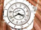 a watch that is sitting on top of a shell
