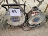 two reels that are sitting on the ground