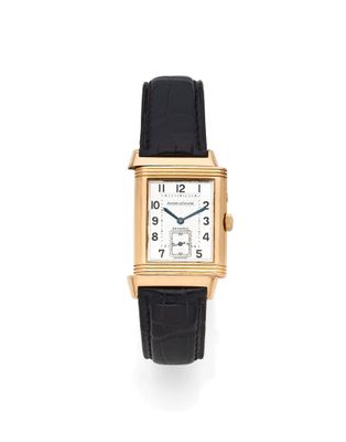 une montre-bracelet rectangulaire en or jaune 18 carats, avec un bracelet en cuir noir