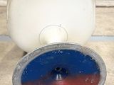 a red, white, and blue object on the ground