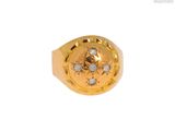 une image représentant une bague en or ornée d'une étoile