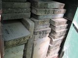 many boxes stacked on top of each other in the back of a truck