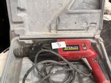 a tool that is sitting in a case on a table