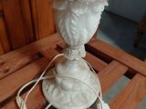 a lamp that is sitting on a wooden table