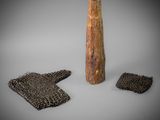 an image of a piece of wood with a chain around it