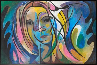 peinture représentant le visage d'une femme dans un style abstrait et coloré