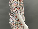 an image of a mannequin dressed in a floral print dress