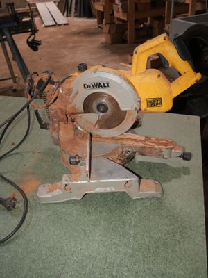 a picture of a circular saw on a table in a workshop