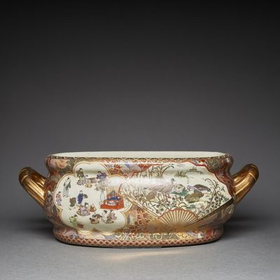 an image of a vase with a handle and handles on a table