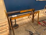 a picture of a workbench with tools on it
