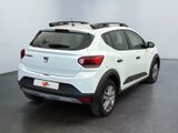 the back of a white car with a roof rack on it