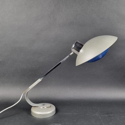 an image of a desk lamp with a white base and a blue shade