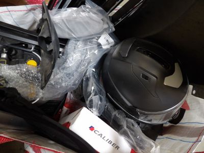 a suitcase full of items that are sitting on a table